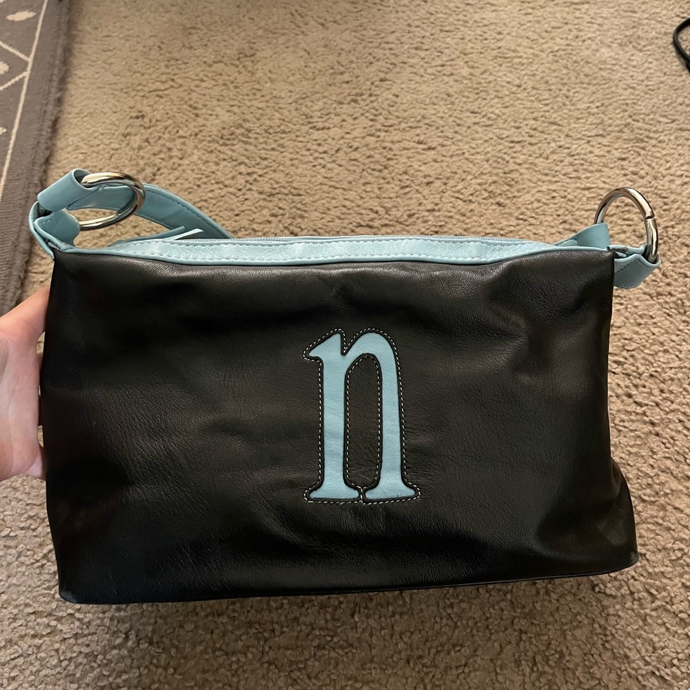 Tiras Leather Monogram “n” Shoulder Bag